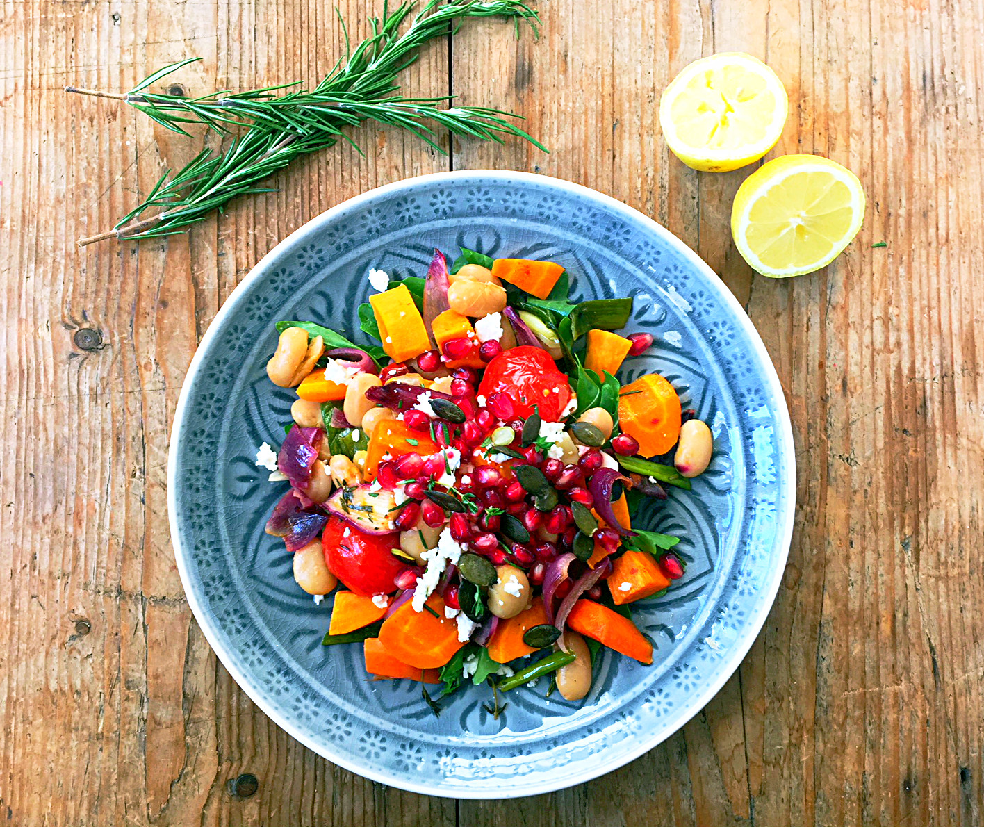 Sweet potato summer bake with feta, pomegranate and fresh herbs